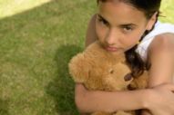 Young carer with teddy
